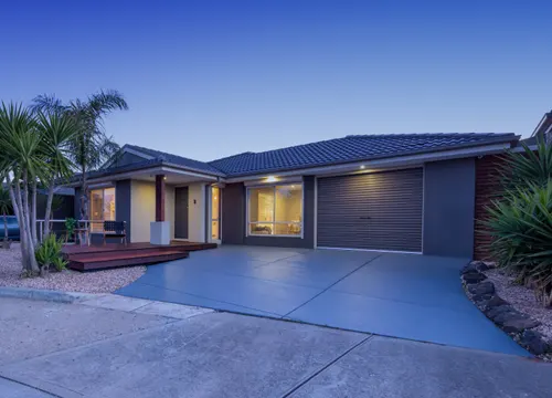 An image of a single story home constructed by Gurzora Homes, highlighting quality and design.